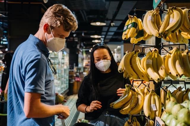 couple shopping in masks